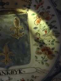 A Chinese famille verte "Provinces" dish with the arms of France, Kangxi/Yongzheng